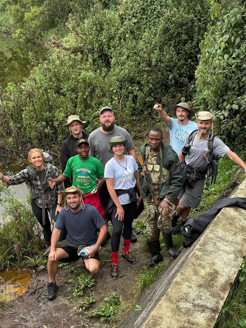 Rwenzori hiking team gathered on a forest trail