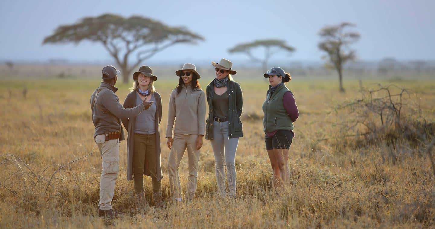 Corporate retreat group on a Uganda safari plain